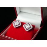 A PAIR OF 18CT WHITE GOLD, RUBY AND DIAMOND EARRINGS. Boxed. (approx diamond 1.00ct, ruby 2.29ct, BG