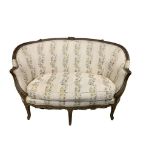 AN 18TH CENTURY FRENCH LOUIS XV CARVED WOOD AND PAINTED SETTEE The shaped back and scrolling arms