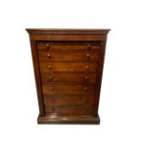 A VICTORIAN MAHOGANY SECRETAIRE WELLINGTON CHEST The five drawers and central fitted secretaire