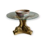 A DECORATIVE MID 20TH CENTURY POLISH BRASS COFFEE TABLE The glass top inserted with a large