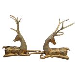 A LARGE PAIR OF DECORATIVE MID 20TH CENTURY POLISH BRASS SCULPTURE OF SEATED DEER. (h 62.5cm x d