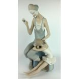 LLADRO, A LARGE MATT GLAZED PORCELAIN GROUP FIGURE Titled 'Clown with Ballerina', a seated clown