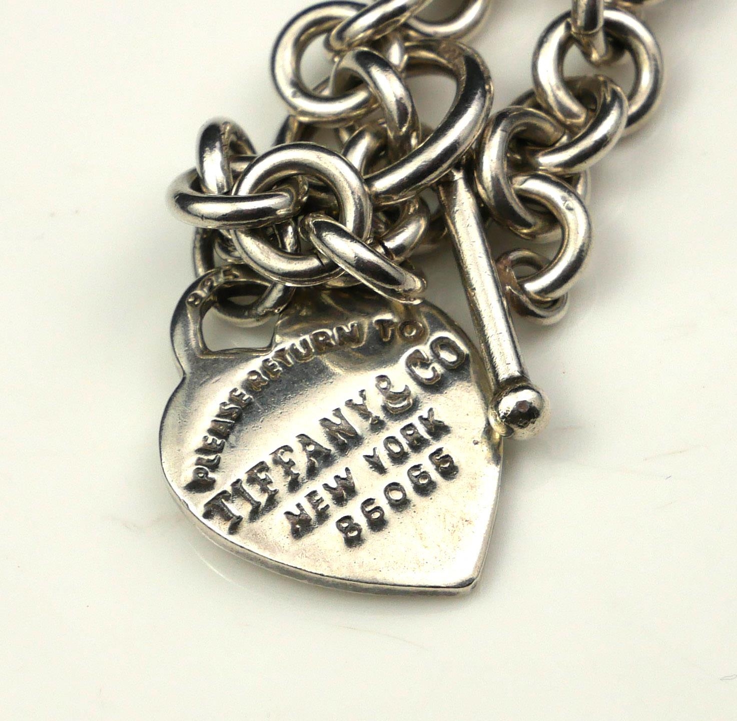 TIFFANY & CO., A VINTAGE SILVER NECKLACE Having a heart form fob marked 'Please Return To - Image 3 of 3