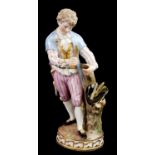 MEISSEN, A FINE HIGHLY DECORATIVE MID 19TH CENTURY MODEL OF A YOUNG GENTLEMAN COLLECTING EMBERS