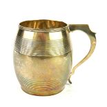 A GEORGIAN SILVER BULBOUS CHRISTENING MUG With a single handle and engraved bands, hallmarked
