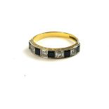 AN EARLY 20TH CENTURY 18CT GOLD, DIAMOND AND SAPPHIRE HALF ETERNITY RING Set with five square cut