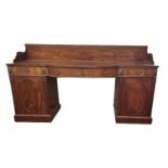 A LARGE 19TH CENTURY MAHOGANY PEDESTAL SIDEBOARD With galleried back above three drawers and oval