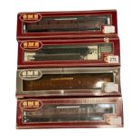 A COLLECTION OF FOUR AIRFIX 00 GAUGE RAILWAY CARRIAGES To include a Bogie Bolster and three