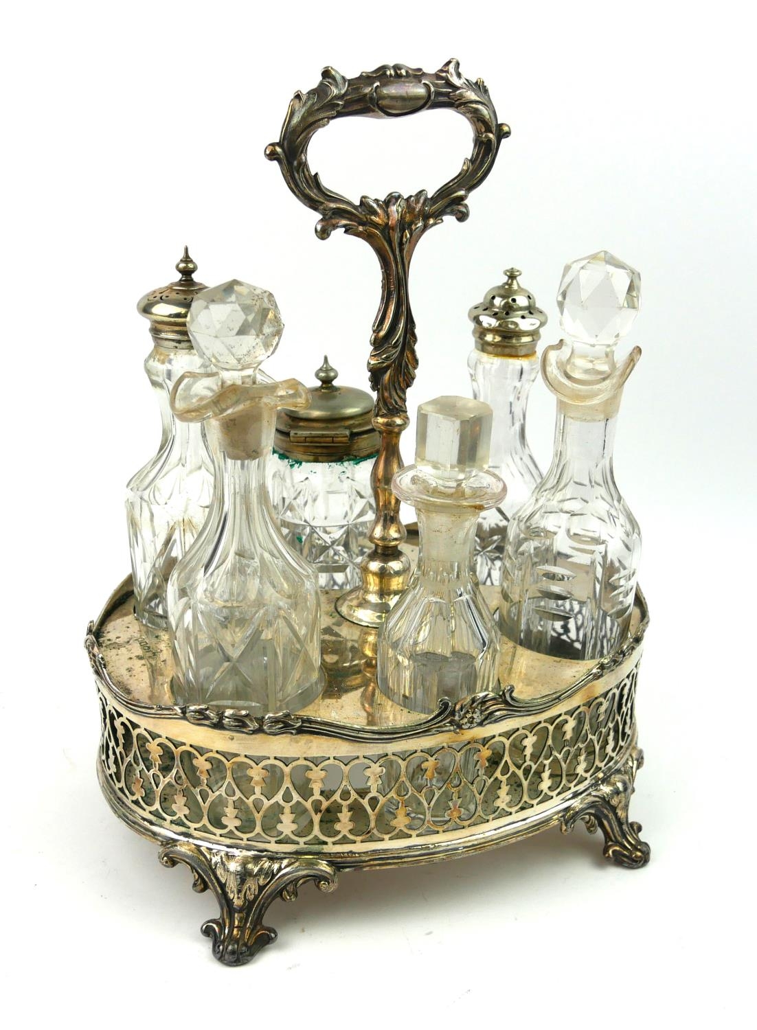 A VICTORIAN SHEFFIELD SILVER PLATE AND GLASS SIX PIECE CRUET SET The pierced gallery border and