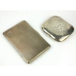 TWO EARLY 20TH CENTURY SILVER RECTANGULAR CIGARETTE CASES With engine turned decoration,