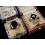 TWO EARLY 20TH CENTURY 20TH CENTURY 9CT GOLD AND ONYX GENT'S SIGNET RINGS Each set with an oval