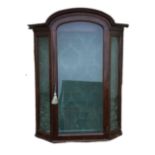 A QUEEN ANNE STYLE MAHOGANY WALL HANGING GLAZED DISPLAY CABINET The hump top above a single glazed