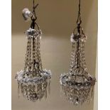 A PAIR OF 19TH CENTURY SILVERED BRONZE AND CRYSTAL BASKET CHANDELIERS. (22cm x 50cm) Condition: good