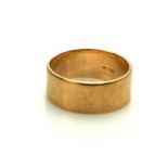A VINTAGE 9CT GOLD WIDE WEDDING BAND. (approx 7g, size X)