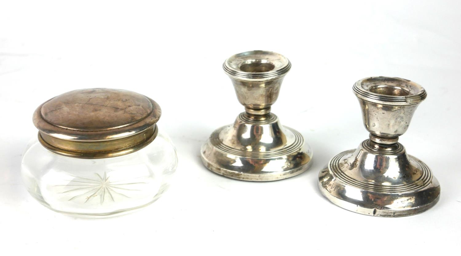 A PAIR OF ART DECO HALLMARKED SILVER DWARF CANDLESTICKS Birmingham 1927, together with an