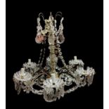 A FRENCH MID CENTURY GILT METAL AND CUT GLASS CHANDELIERS Having six scrolled branch arms with