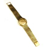 OMEGA, CONSTELLATION, A VINTAGE 18CT GOLD GENT'S WRISTWATCH Having a champagne tone dial with