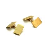 A VINTAGE PAIR OF 9CT GOLD RECTANGULAR GENT'S CUFFLINKS With engine turned decoration. (approx 8g)