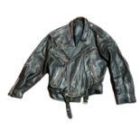 MAURITIUS, A VINTAGE BLACK LEATHER BIKER JACKET Having zip pockets and strap to waist. Condition: