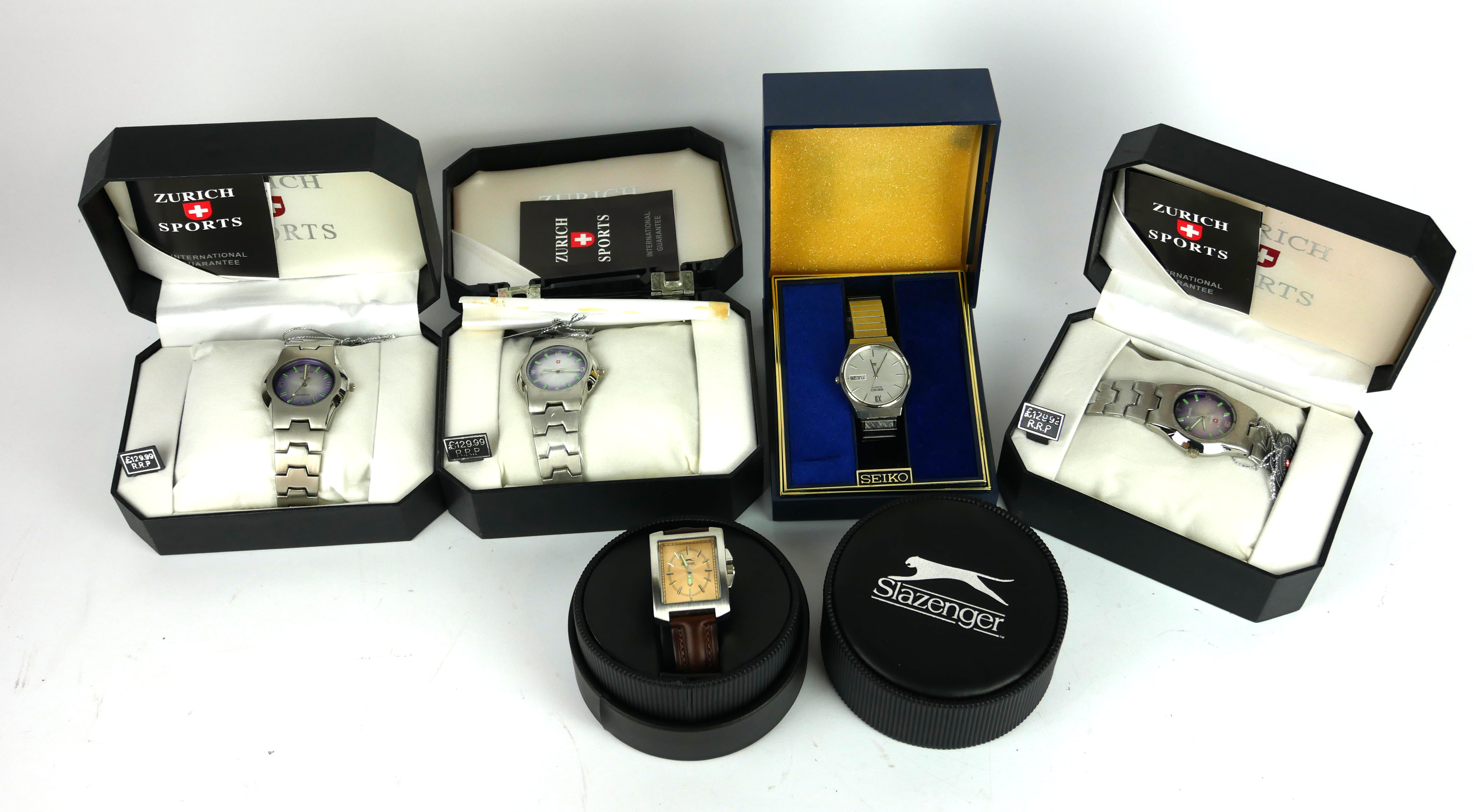 A COLLECTION OF VINTAGE STAINLESS STEEL WATCHES To include three Zurich Sports watches with purple