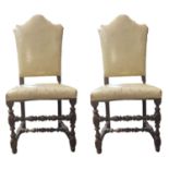 A PAIR 18TH/19TH CENTURY DUTCH OAK CHAIRS with shaped backs, turned and square legs, in cream