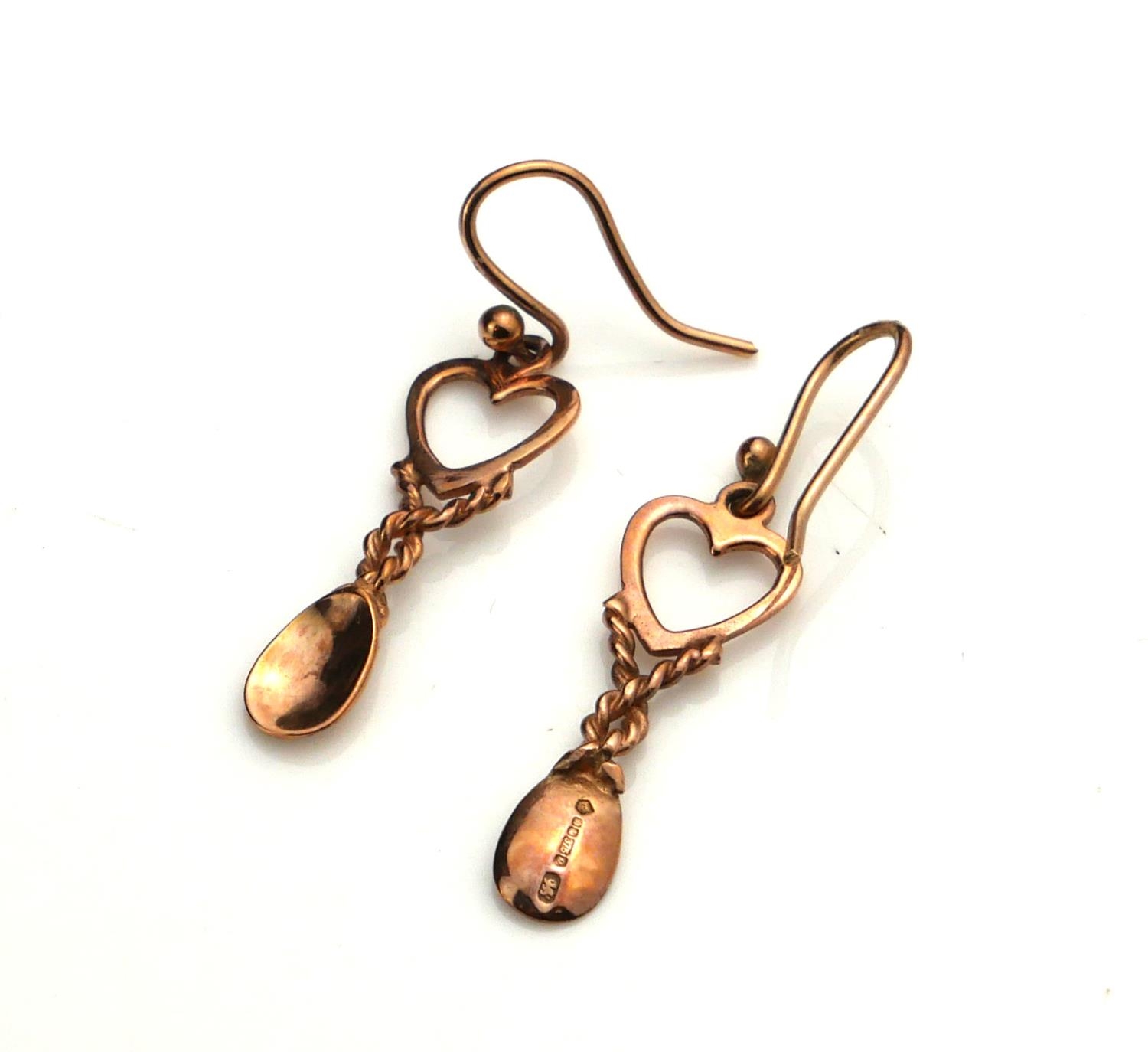 A PAIR OF MODERN 9CT ROSE GOLD EARRINGS FORMED AS WELSH LOVE SPOONS With heart form finials. (approx