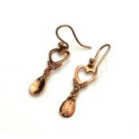 A PAIR OF MODERN 9CT ROSE GOLD EARRINGS FORMED AS WELSH LOVE SPOONS With heart form finials. (approx
