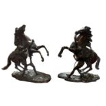 A PAIR OF LATE 19TH/EARLY 20TH CENTURY CAST BRONZE GROUP, MARLEY HORSES Modelled in typical manner