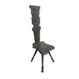 A 19TH CENTURY EBONISED OAK COUNTRY CHAIR With high back carved panelled and pierced top on bobbin