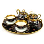 LIMOGES, PARIS, AN ART DECO AVANT GARDE DESIGN CABARET TEA SERVICE FOR TWO Decorated with a