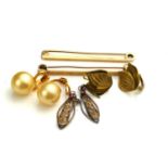 TWO MID CENTURY 9CT GOLD GENT'S TIE PINS Plain rectangular form, together with a pair of yellow