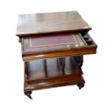 A VICTORIAN ROSEWOOD MUSIC CANTERBURY, with two drawers and pierced fretwork supports Condition good