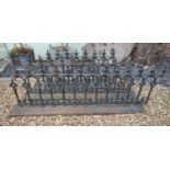 A SET OF VICTORIAN GOTHIC STYLE CAST IRON RAILINGS In three sections. (475cm) Condition: some