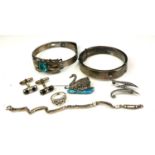 A COLLECTION OF EARLY 20th CENTURY SILVER JEWELLERY Comprising a bangle set with blue paste stone, a