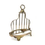 A VICTORIAN SILVER CLASSICAL FORM TOASTRACK With loop handle and pierced frame, on scrolled legs,