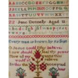 JAMES DONNELLY, AGED 12, AN EARLY 20TH CENTURY NEEDLEWORK SAMPLER Framed and glazed. (31cm x 41cm)