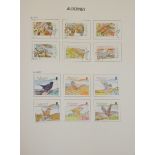 THREE GUERNSEY, JERSEY AND ISLE OF MAN STAMP ALBUMS,1978 - 2010. Condition: good overall
