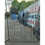 A PAIR OF LARGE VICTORIAN STYLE WROUGHT IRON DRIVEWAY GATES With traditional scrollwork panels. (w