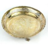 AN EDWARDIAN SILVER CIRCULAR SWEETMEAT BASKET With pierced gallery, on ball and claw feet,