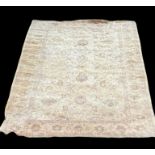 A LARGE ZIEGLER RUG OF CARPET PROPORTIONS With floral field on a beige ground. (575cm x 360cm)