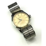 ROLEX, OYSTER ROYAL, A VINTAGE STAINLESS STEEL GENT'S WRISTWATCH The cream tone dial with steel