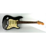 A COLLECTION OF FOUR VINTAGE ELECTRIC FENDER DESIGN GUITARS Each bearing black with white scratch