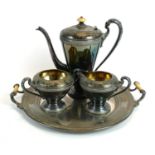 AN EARLY 20TH CENTURY AMERICAN SILVER PLATED THREE PIECE COFFEE SERVICE AND TRAY Conical form coffee