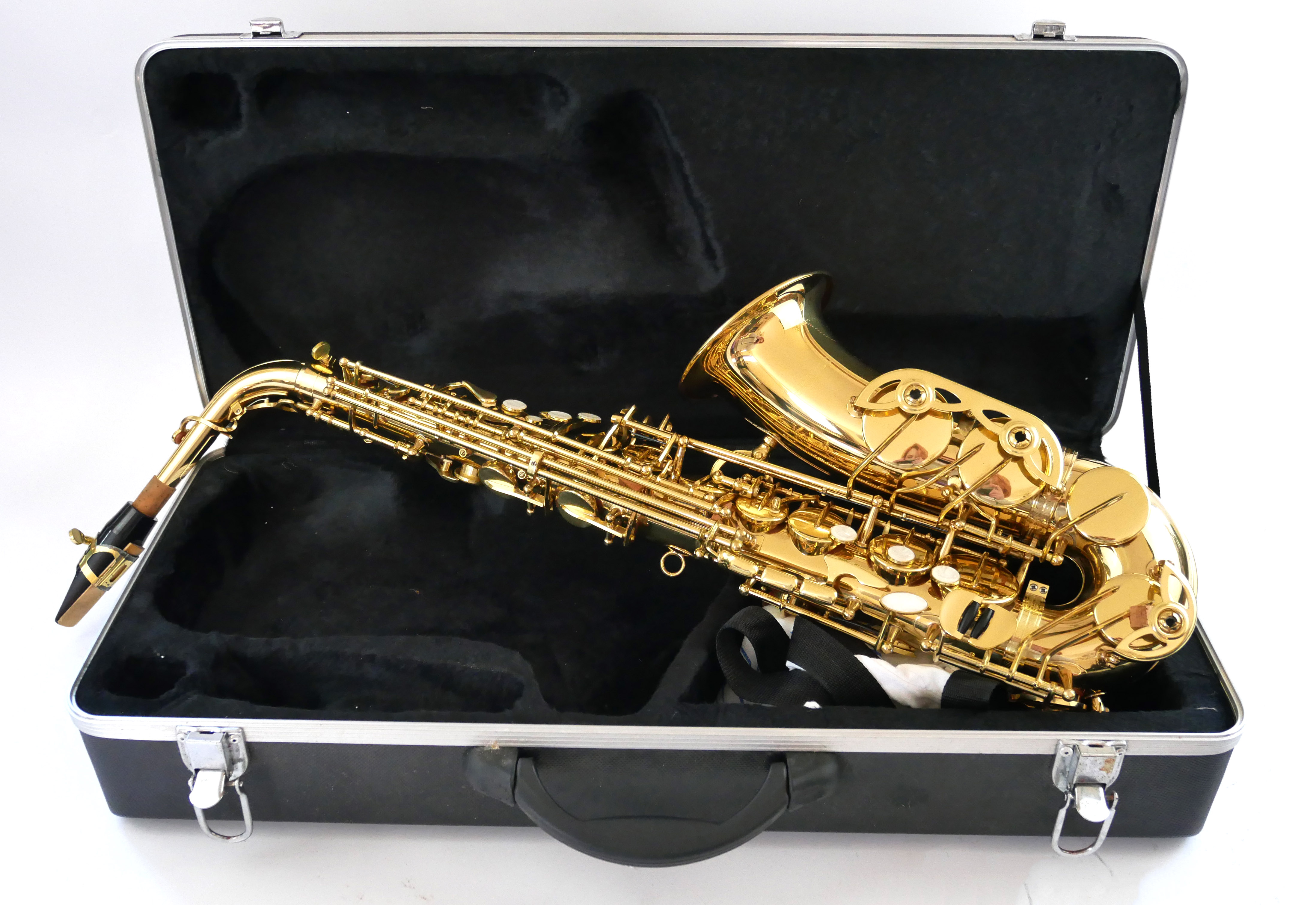 A MODERN BRASS AND MOTHER OF PEARL SAXOPHONE Having circular mother of pearl pads to keys marked '