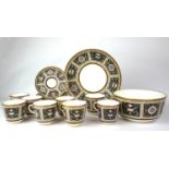 A SET OF EIGHT ATTRACTIVE SÈVRES STYLE BONE CHINA CUPS AND SAUCERS Richly painted in gilt with