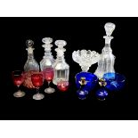 A SET OF FOUR VARIOUS GEORGIAN PERIOD CUT CRYSTAL GLASS DECANTERS AND MATCHING STOPPERS Two small