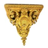 AN IMPRESSIVE 19TH CENTURY ROCOCO STYLE CARVED GILDED WOOD WALL BRACKET Deeply carved openwork