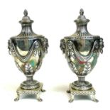 GARRARD, A PAIR OF VICTORIAN SILVER TEA CADDIES Classical urn form, with twin lion mask handles,