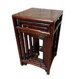 A NEST OF FOUR EARLY 20TH CENTURY CHINESE HARDWOOD TABLES With square chamfered legs joined by