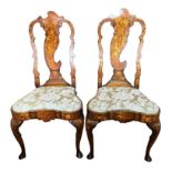 A PAIR OF 18TH CENTURY DUTCH WALNUT AND FLORAL MARQUETRY CHAIRS With cartouche backs floral